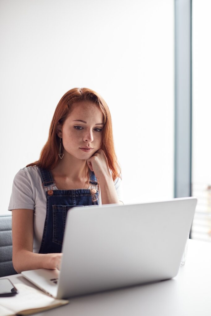 Young Woman Working On Laptop