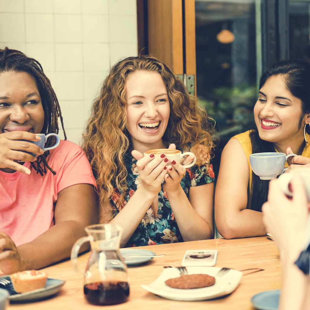 Young Women Drinking Coffee