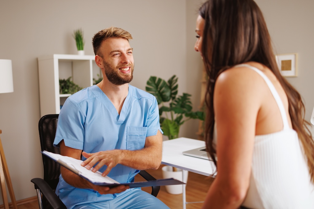 Young woman consults with her doctor