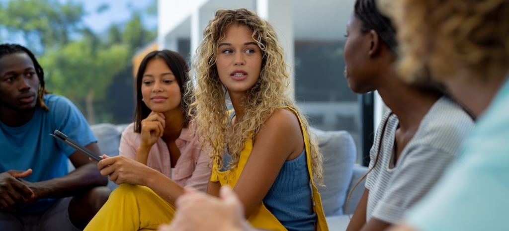 group therapy session of women